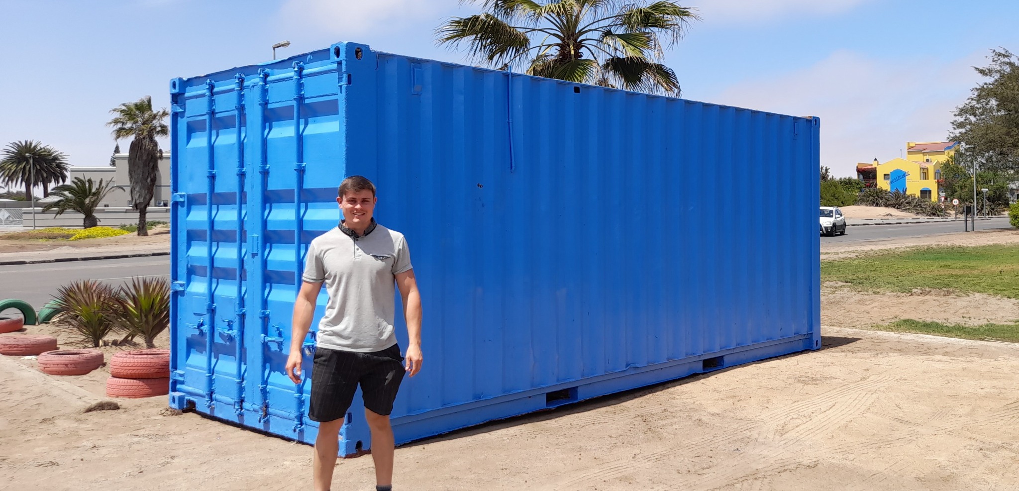 Owner of Coastal Containers with completed container project